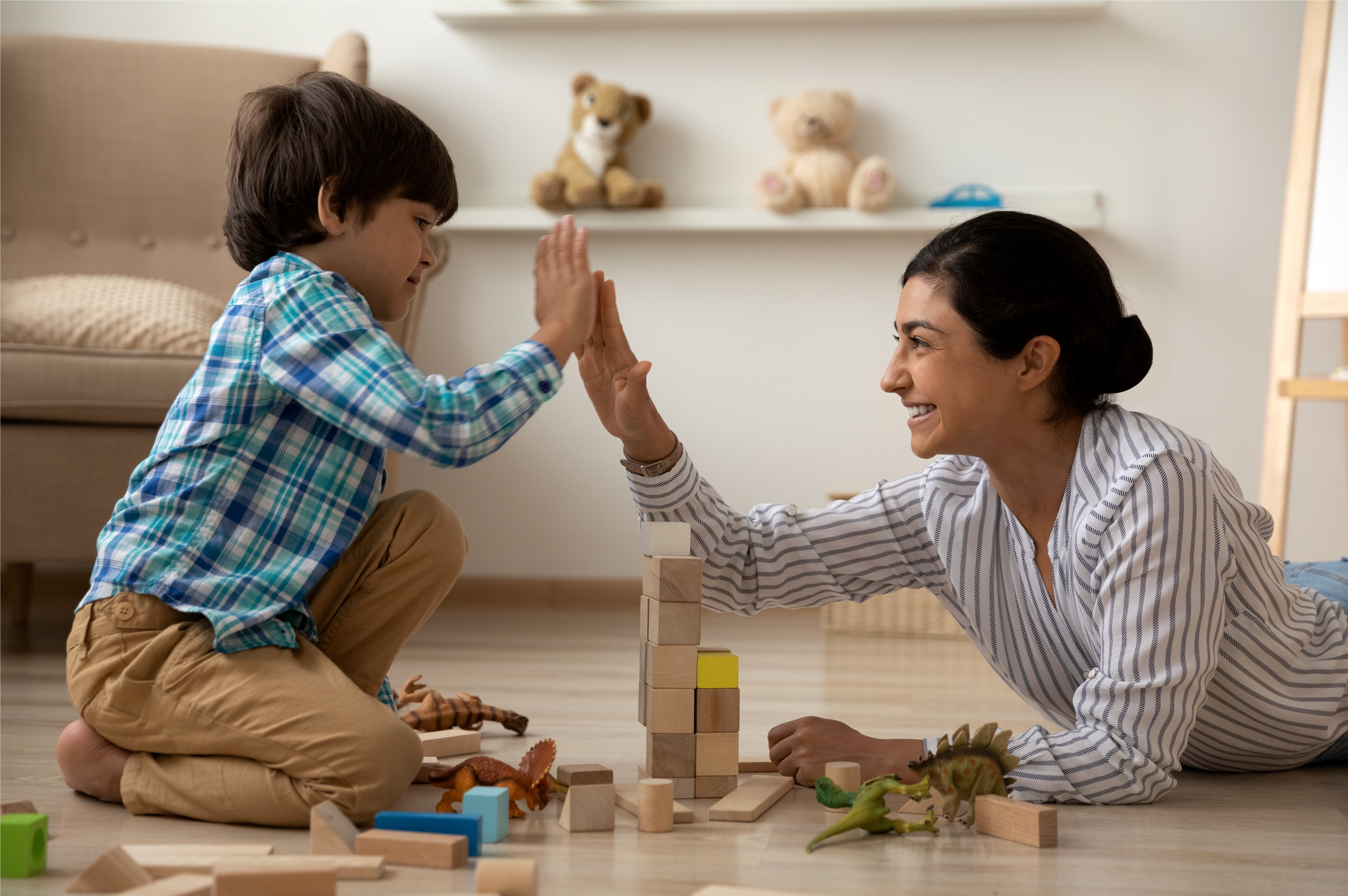 Mother high fiving son